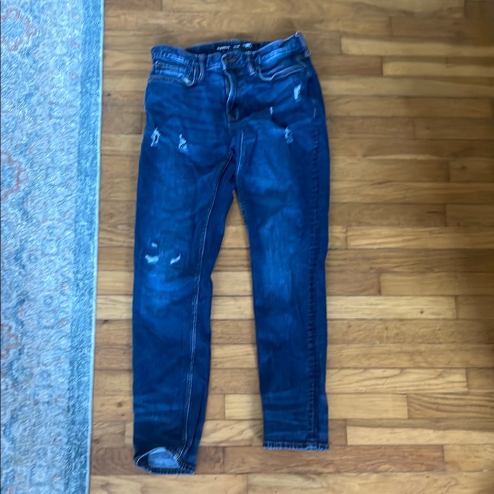 Ripped Old Navy blue jeans, relaxed slim taper with built in flex!